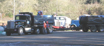 Camp Bonnevilletruckstohaulsoilfromlandfillfour These trucks are used to haul the soil from landfill four. They are also used to haul the contaminated soil to the landfill in Oregon. Worried neighbors reported that these trucks may have been dropping contaminated slush in their neighborhood during a rainstorm.